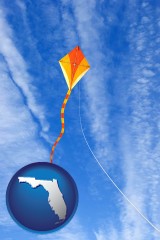 florida map icon and flying a kite