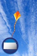 kansas map icon and flying a kite