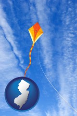 new-jersey map icon and flying a kite