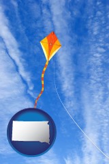 south-dakota map icon and flying a kite