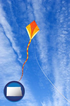 flying a kite - with North Dakota icon