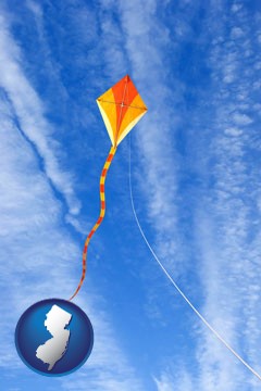 flying a kite - with New Jersey icon